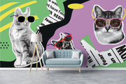 Retro pop art wall mural featuring black-and-white cats wearing colorful sunglasses, with a vibrant mix of geometric patterns, newspaper clippings, and bold colors.