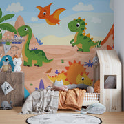 Playful cartoon dinosaur wall mural featuring friendly dinosaurs, a prehistoric landscape, volcanoes, and palm trees in bright, colorful tones for kid's rooms.