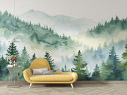 Watercolor forest wall mural with misty mountains and lush green trees, creating a serene and calming nature-inspired ambiance.