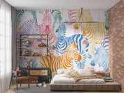 Multicolor zebra wall mural featuring vibrant pink, blue, orange, and yellow zebras on a white background, ideal for modern decor.