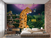 Midnight Safari wall mural with a whimsical leopard in a vibrant jungle, surrounded by butterflies and a glowing purple moon, styled in a modern bedroom.
