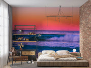 Tropical Ocean Sunset Wall Mural – Vibrant Seascape Wallpaper Featuring Rolling Waves, a Pink-Orange Twilight Sky, and a Relaxing Coastal Ambiance for Modern Interiors.