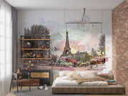 Watercolor Paris mural featuring the Eiffel Tower with pastel skies and ink sketch trees in a stylish bedroom setting.