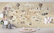 Vintage-style children's world map wall mural with hot air balloons and animals, styled in neutral nursery.