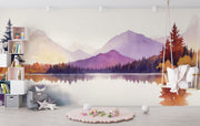 Watercolor mountain lake wall mural with warm autumn hues, reflecting trees, and serene nature-inspired scenery.