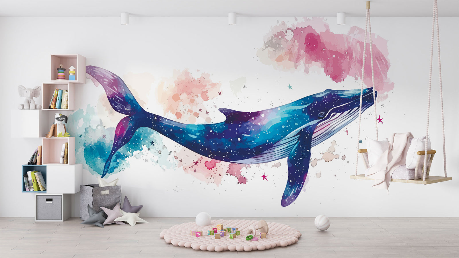 Vibrant galaxy whale wall mural featuring a watercolor-style blue whale swimming through a cosmic, star-filled background in shades of blue, purple, and pink – perfect for kids' rooms and modern decor.