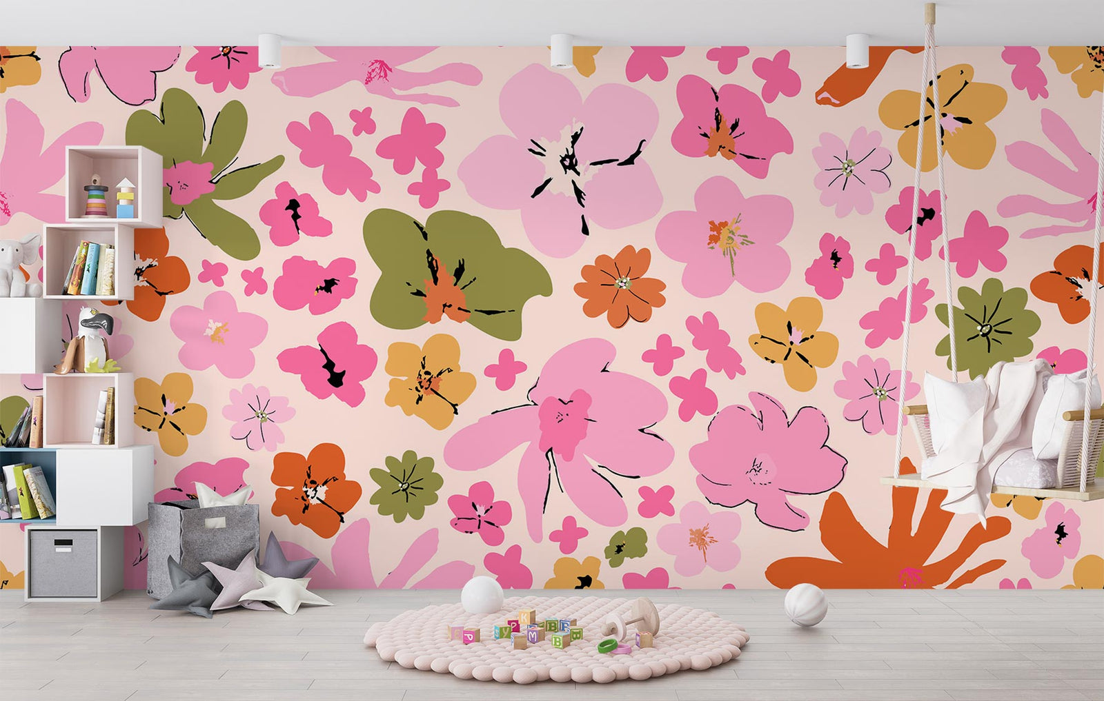 Vibrant floral wall mural featuring pink, orange and green abstract flowers, decorating a children’s playroom with a swing chair, pastel decor, and toy-filled storage.