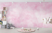 Blush Dreams soft pink watercolor wall mural in a kids playroom.