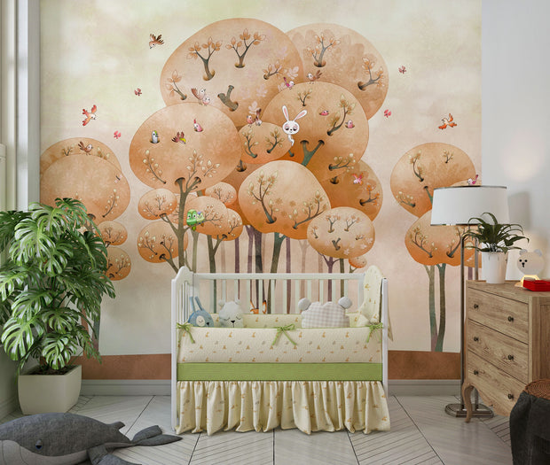 Woodland adventure wall mural with illustrated trees, animals and playful nature elements in a cozy children's room setting.