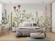 Meadow Bloom Wall Mural featuring delicate wildflowers and lush greenery on a soft-toned background.