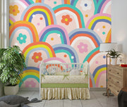 Kids wall mural with retro-style rainbow arches and colorful flowers in a playful, vintage-inspired nursery.