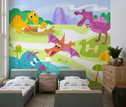 A playful dinosaur wall mural with bright cartoon-style dinosaurs, a volcano, greenery, and prehistoric elements in a kids' room.