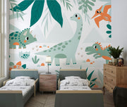 Kids’ bedroom wall mural featuring cute dinosaurs like triceratops, sauropod, and pterodactyls in a soft leafy landscape design.