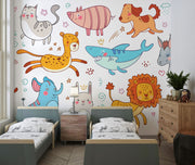Colorful cartoon animal wall mural in a children's playroom featuring a fox, lion, bunny, shark, elephant, and more