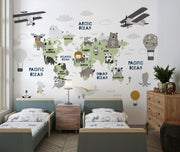 Scandinavian style children's world map wall mural with cute animals and airplanes, styled in a kid's bedroom.