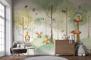 Woodland fox wall mural featuring playful foxes, treehouses, and a lush green forest; perfect for nursery, kid's bedroom or playroom décor.