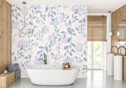 Delicate pastel floral wall mural with soft lavender, blush pink, and green botanical patterns in a bathroom.