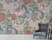 Garden bloom wall mural with pastel pink, green, and blue peonies and leaves, styled in a living room.