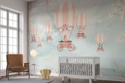 Whimsical kids’ wall mural with baby animals in hot air balloons, cherry blossoms, and a pastel sky—perfect for nurseries and playrooms.