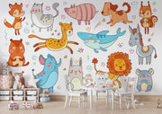 Colorful cartoon animal wall mural in a children's playroom featuring a fox, lion, bunny, shark, elephant, and more