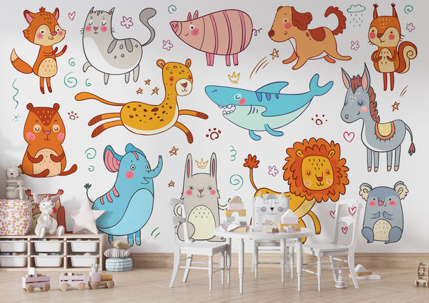 Colorful cartoon animal wall mural in a children's playroom featuring a fox, lion, bunny, shark, elephant, and more
