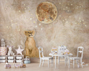 Safari lion cub wall mural featuring a realistic lion cub gazing at a glowing moon, surrounded by stars and warm beige tones, perfect for a cozy nursery.