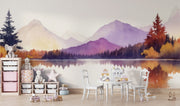 Watercolor mountain lake wall mural with warm autumn hues, reflecting trees, and serene nature-inspired scenery.
