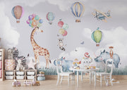 Safari-themed wall mural with watercolor animals, hot air balloons, and a pastel sky—ideal for nursery and kids' room décor.