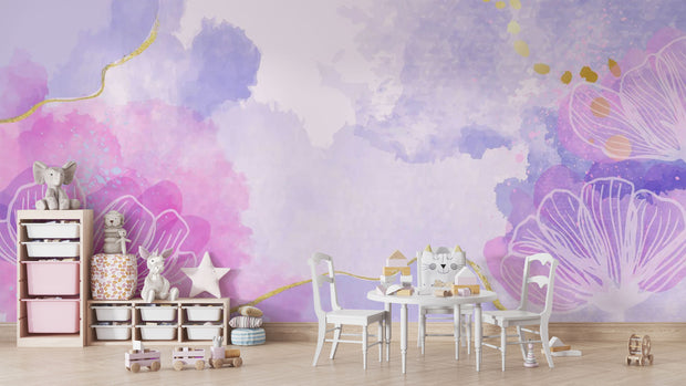 Watercolor flower-themed mural in pink, purple, and lavender with gold accents, decorating kid's playroom.