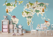 Dinosaur world map wall mural featuring illustrated dinosaurs on different continents, set against a blue background, perfect for kid's rooms and playrooms.