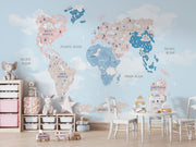 Pastel dinosaur world map wall mural featuring adorable prehistoric creatures, soft blue and pink tones and a whimsical design; perfect for kid's rooms and nurseries.