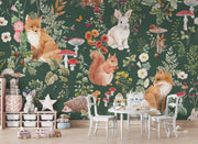 Enchanted forest animals wall mural with foxes, rabbits, hedgehogs, wildflowers, and mushrooms in a vintage botanical style, set against a deep green background.