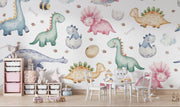 Watercolor dinosaur wall mural featuring pastel-colored dinos, dino eggs, and footprints for a fun nursery or kids' room.