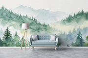Watercolor forest wall mural with misty mountains and lush green trees, creating a serene and calming nature-inspired ambiance.