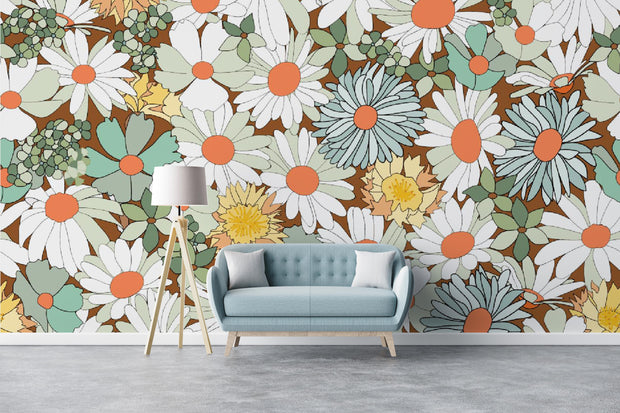 Floral wallpaper with a couch and lamp in front