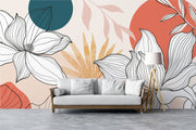 Living room with modern line art floral mural featuring abstract background in terracotta, beige, and teal.