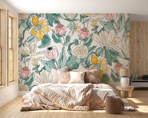 Charming  floral wall mural with pink, yellow, and green flowers in a cozy bohemian bedroom with natural wood decor.