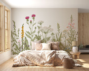 Meadow Bloom Wall Mural featuring delicate wildflowers and lush greenery on a soft-toned background.