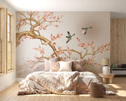 Chinoiserie-style wall mural featuring blooming cherry blossoms, elegant birds in flight, and a soft watercolor-inspired background with a subtle sun.