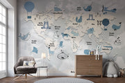Children’s world map wall mural with cute animals, ocean creatures, and pastel sky background – perfect for kid's rooms and nurseries.