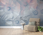 Ethereal large-scale poppy wall mural in soft blues and pinks, styled in a modern minimalist living room.