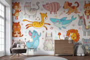 Colorful cartoon animal wall mural in a children's playroom featuring a fox, lion, bunny, shark, elephant, and more