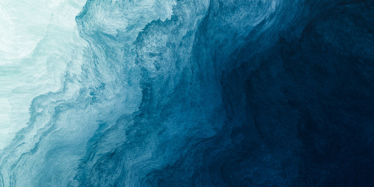 Deep blue abstract wall mural with flowing textures, creating a calming and elegant bedroom atmosphere.