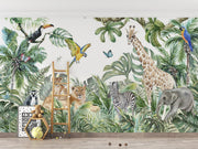 Safari adventure wall mural featuring watercolor jungle animals such as lions, giraffes, zebras, and parrots, styled in a cozy kids' playroom.