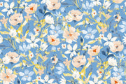 Bold botanical wall mural with vibrant blue, beige, and yellow flowers.