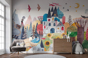 Children's room with colorful mural featuring houses, trees, and animals.