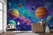 Room interior with a colorful space-themed wall mural featuring planets and stars.