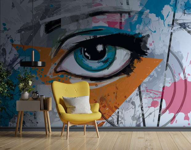 Abstract eye graffiti wall mural with bold blue eye, orange and teal splashes, and street art-inspired brushstrokes.