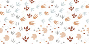 Minimalist dinosaur tracks wall mural with neutral-toned footprints.