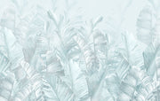 Soft blue palm leaf wall mural featuring oversized banana leaves on a light pastel background, perfect for modern interiors.